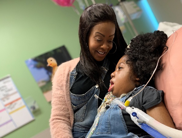 Carmenia (left) received financial assistance through the Antoinette’s Kids Fund while her daughter, Olivia (right), was hospitalized.