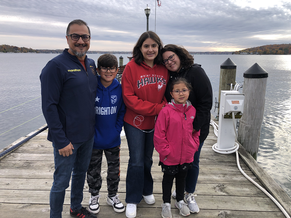 Amelie (center) and her family